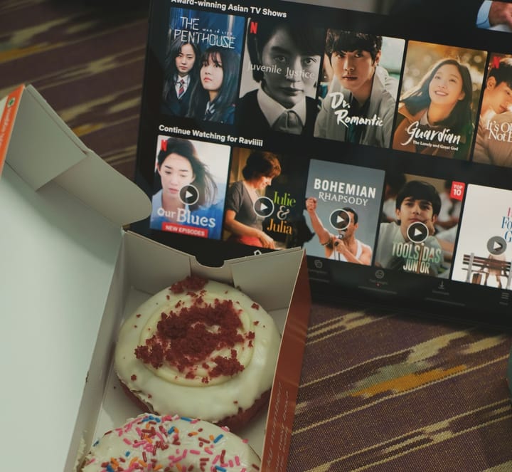 Tablet showing a homepage of an online streaming platform showing kdramas and other shows.